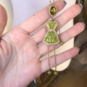 Gold Necklace with girl figurine